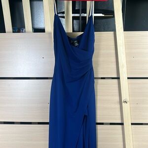 Selling this long clean-fitting dress.
